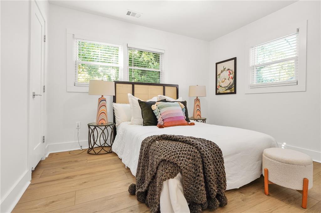 1580 Beecher Street Southwest Atlanta, GA 30310 - Photo 9 of 15 a bedroom with a bed and a window