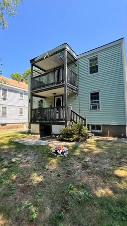 a front view of a house with swimming pool