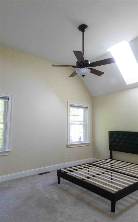 171 North Main Street, Unit 171 Natick, MA 01760 - Photo 11 of 19 a view of a room with gym equipment on wooden floor