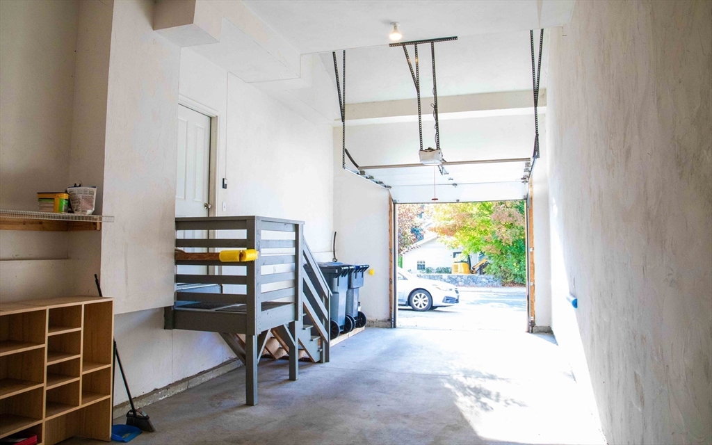 171 North Main Street, Unit 171 Natick, MA 01760 - Photo 18 of 19 a room with furniture and a potted plant