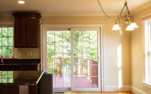 a kitchen with a window a sink and a counter space