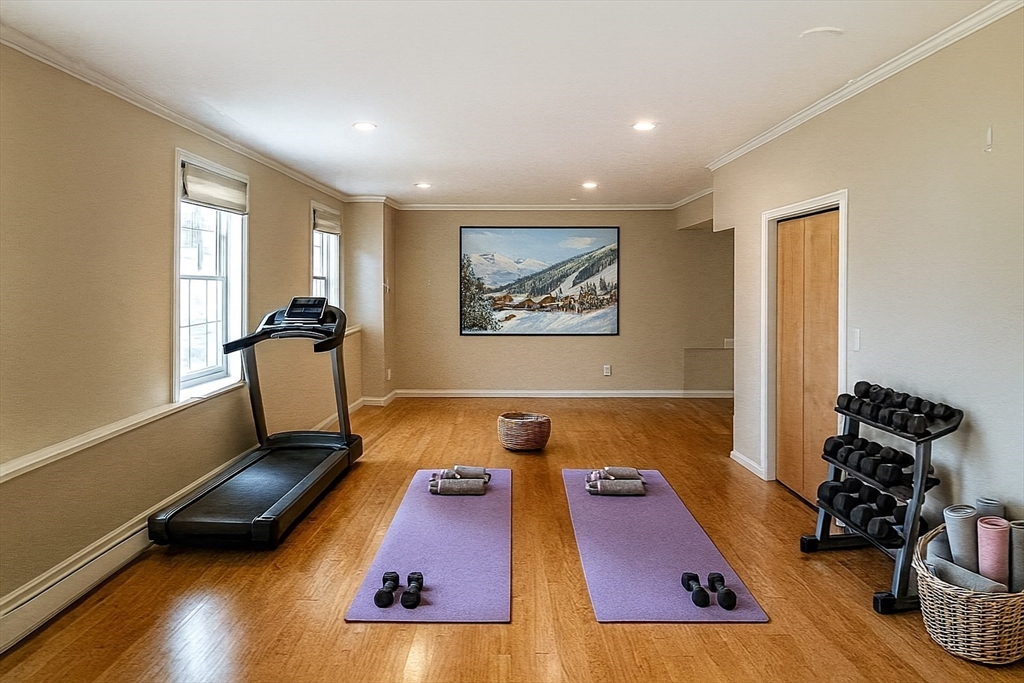 171 North Main Street, Unit 171 Natick, MA 01760 - Photo 7 of 19 a living room with furniture and a wooden floor