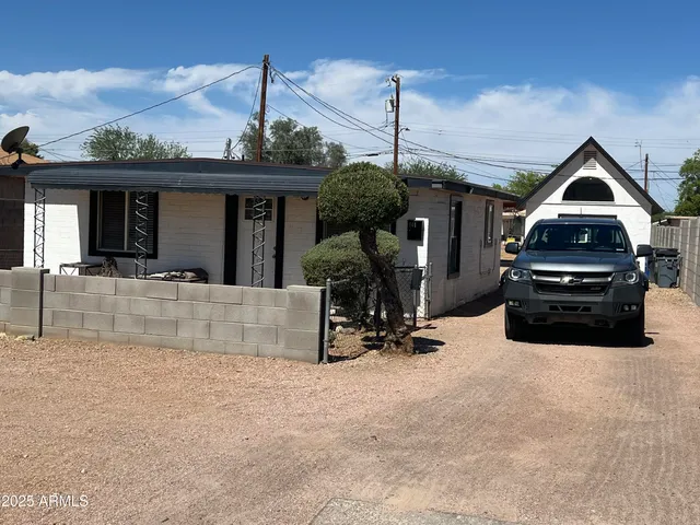 a view of a house with a park