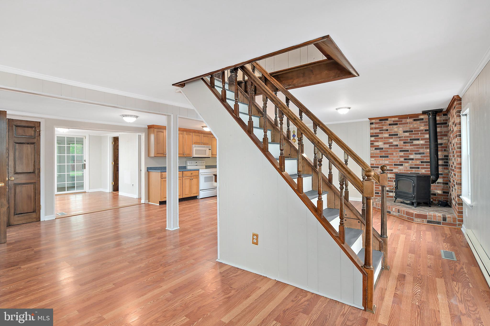 10826 Brownstone Road Princess Anne, MD 21853 - Photo 15 of 68 a view of an entryway wooden floor and an entryway with wooden floor