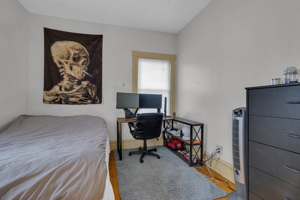 5 Sachem Street, Unit 3 Boston, MA 02120 - Photo 15 of 22 a bedroom with a workspace