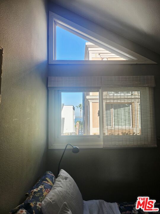 73 A Surfside Avenue Surfside, CA 90743 - Photo 11 of 18 a living room with furniture and a window