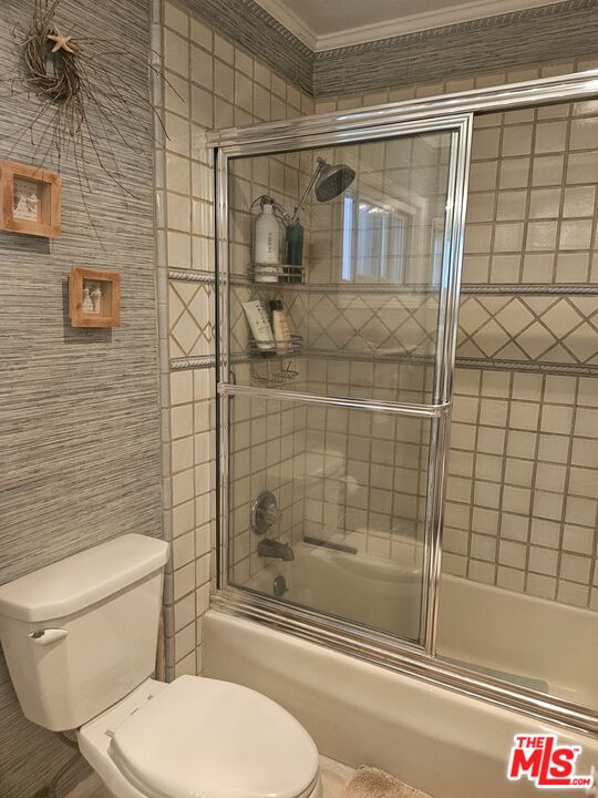 73 A Surfside Avenue Surfside, CA 90743 - Photo 12 of 18 a bathroom with a toilet and a shower