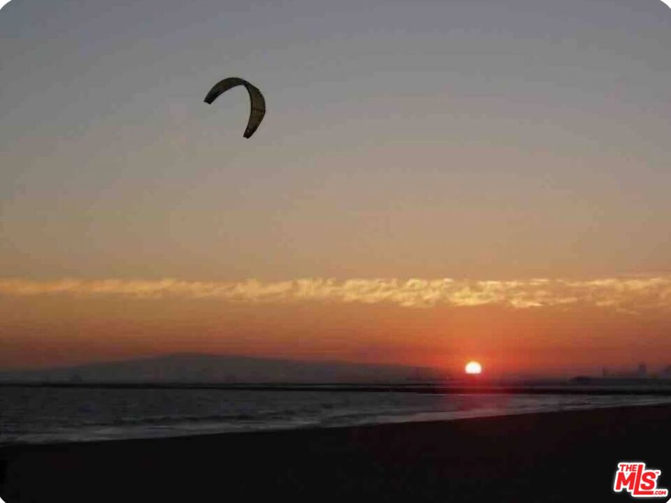 73 A Surfside Avenue Surfside, CA 90743 - Photo 17 of 18 a view of sky from under an umbrella