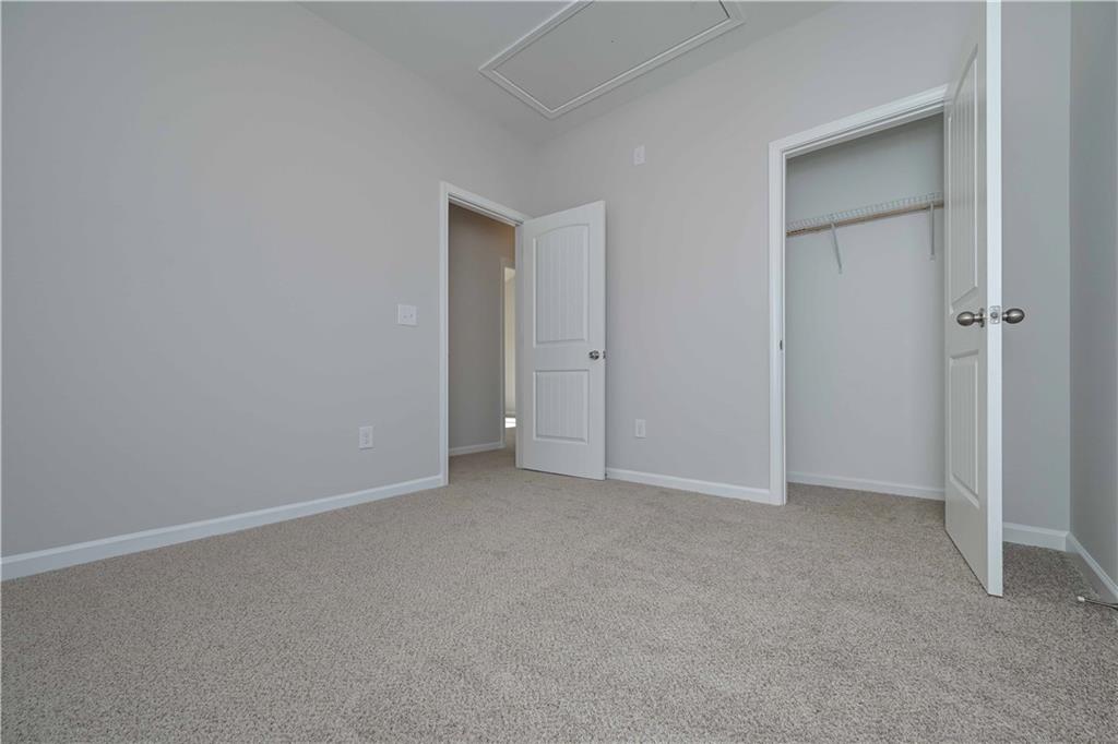 499 Charleston Place Villa Rica, GA 30180 - Photo 21 of 30 an empty room with closet area