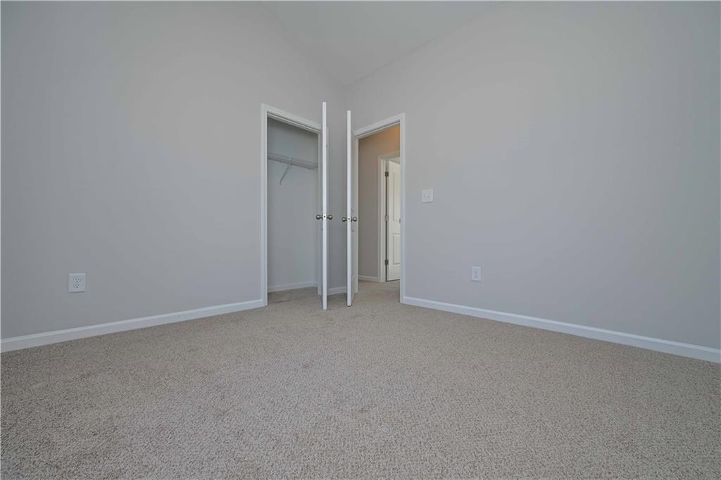 499 Charleston Place Villa Rica, GA 30180 - Photo 23 of 30 a view of an empty room