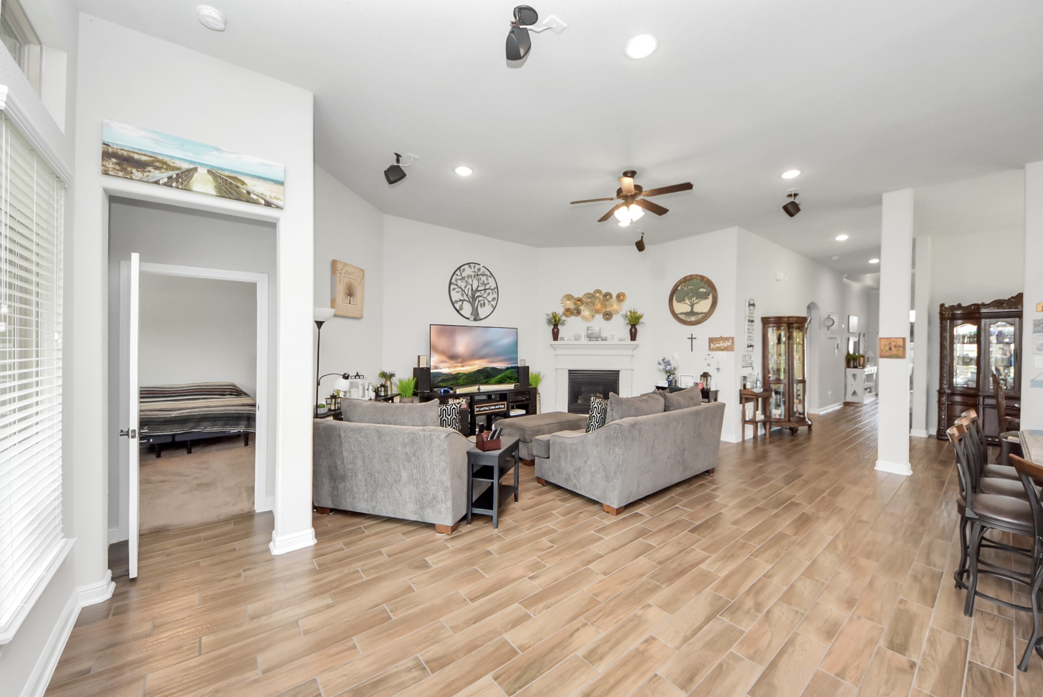 24503 Eucalyptus Way Spring, TX 77373 - Photo 14 of 27 a living room with furniture and a wooden floor
