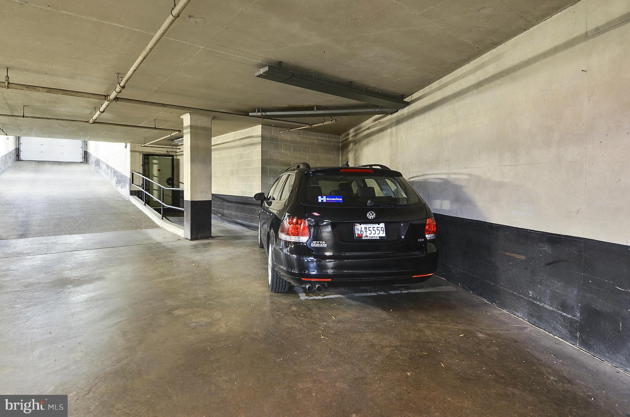 2401 H Street Northwest, Unit 309 Washington, DC 20037 - Photo 17 of 28 a car parked in a garage