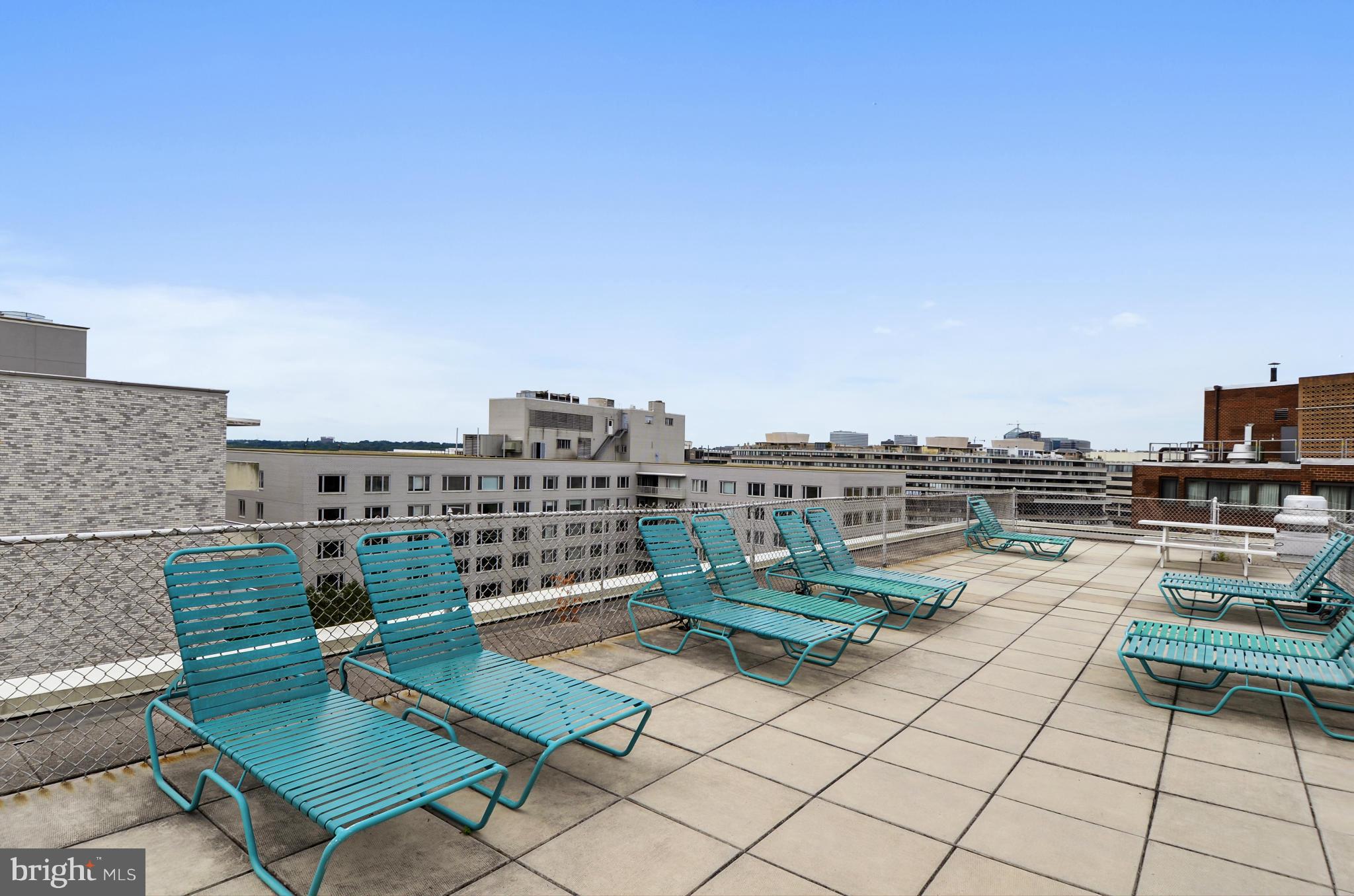 2401 H Street Northwest, Unit 309 Washington, DC 20037 - Photo 19 of 28 a view of terrace with seating space and barbeque oven