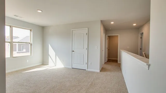 a view of livingroom with hardwood floor and window