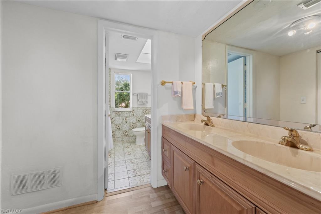 197 Albi Road, Unit 2 Naples, FL 34112 - Photo 33 of 50 Guest Bathroom