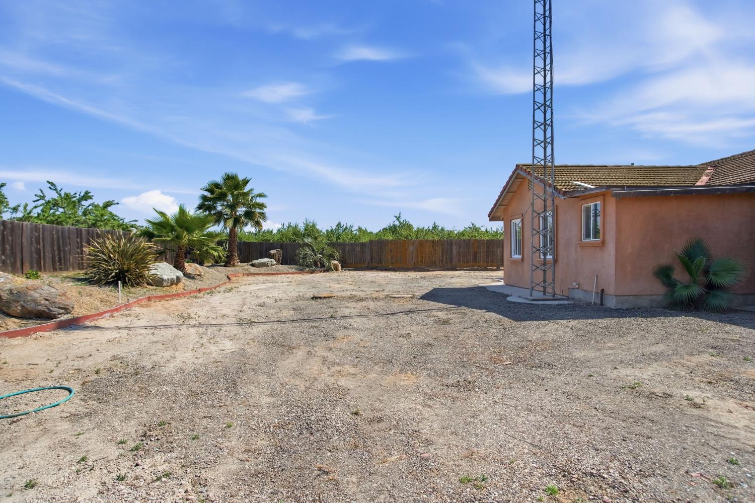 5200 North Gratton Road Denair, CA 95316 - Photo 23 of 40 a view of a house with a yard