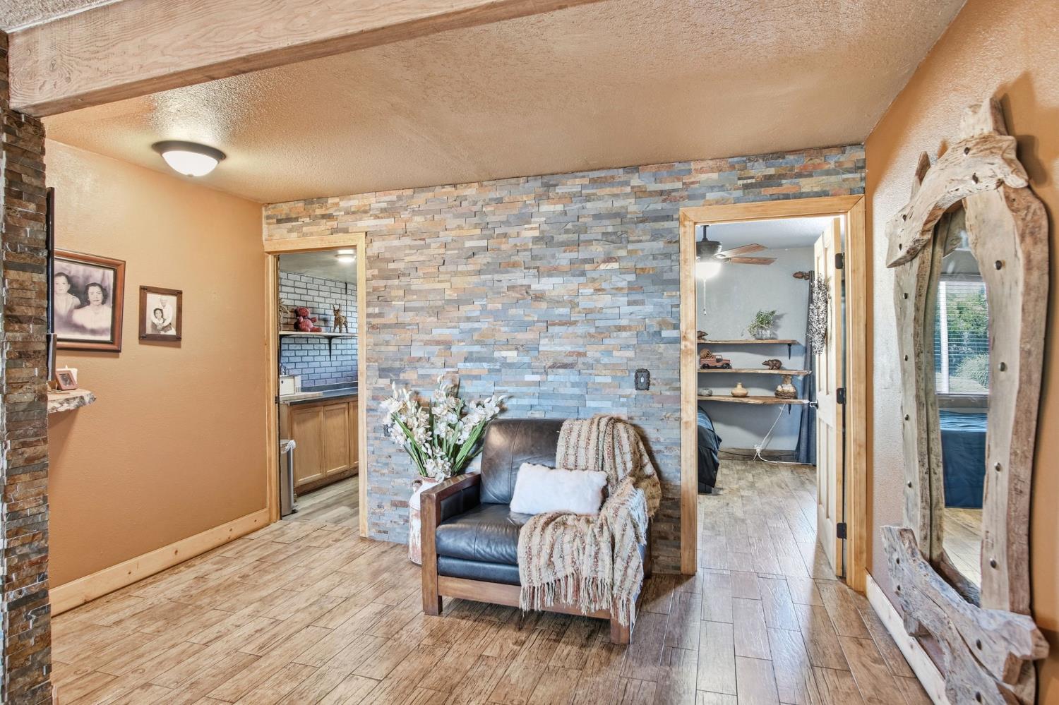 5200 North Gratton Road Denair, CA 95316 - Photo 6 of 40 a living room with furniture and a fireplace