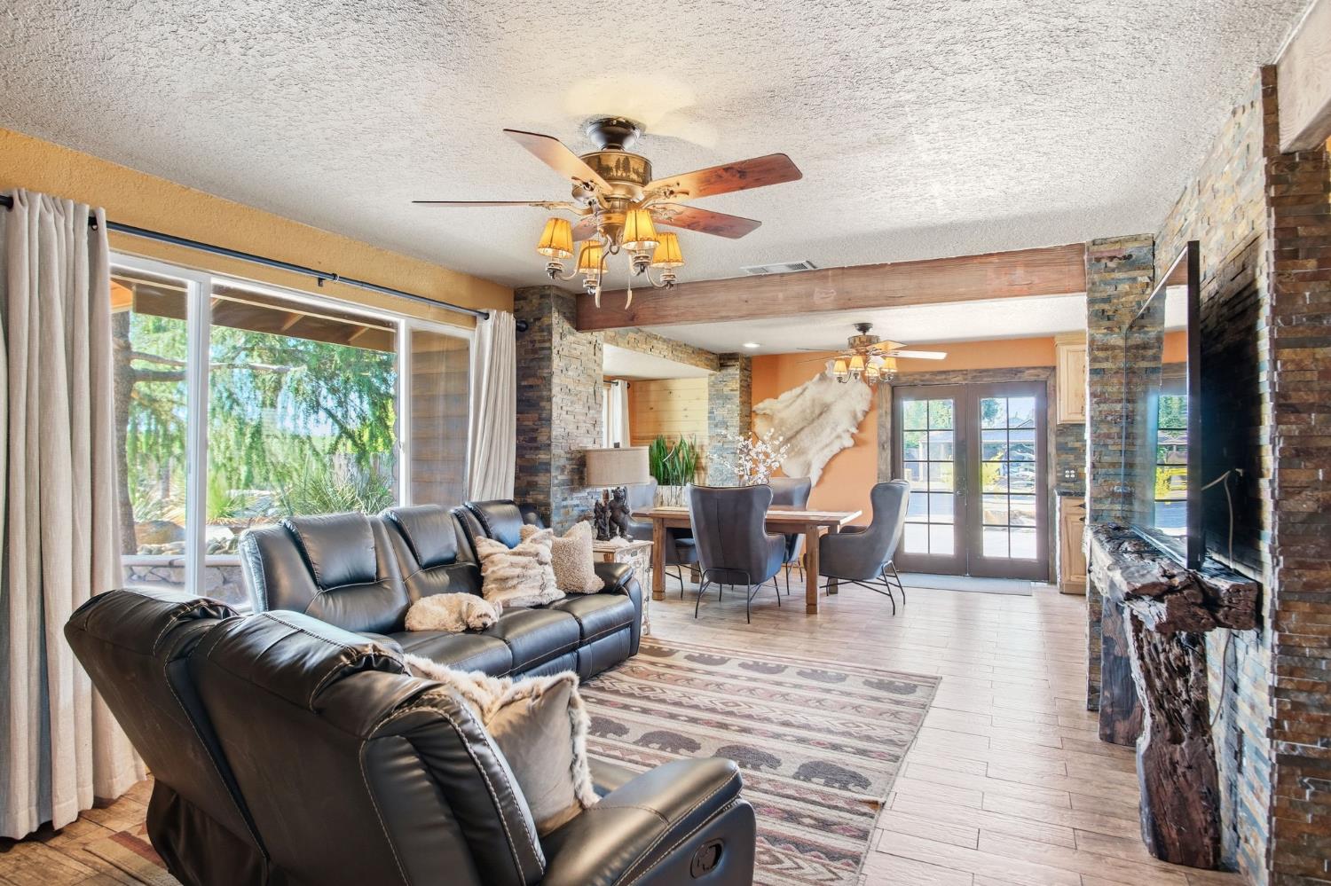5200 North Gratton Road Denair, CA 95316 - Photo 8 of 40 a living room with furniture large window and wooden floor