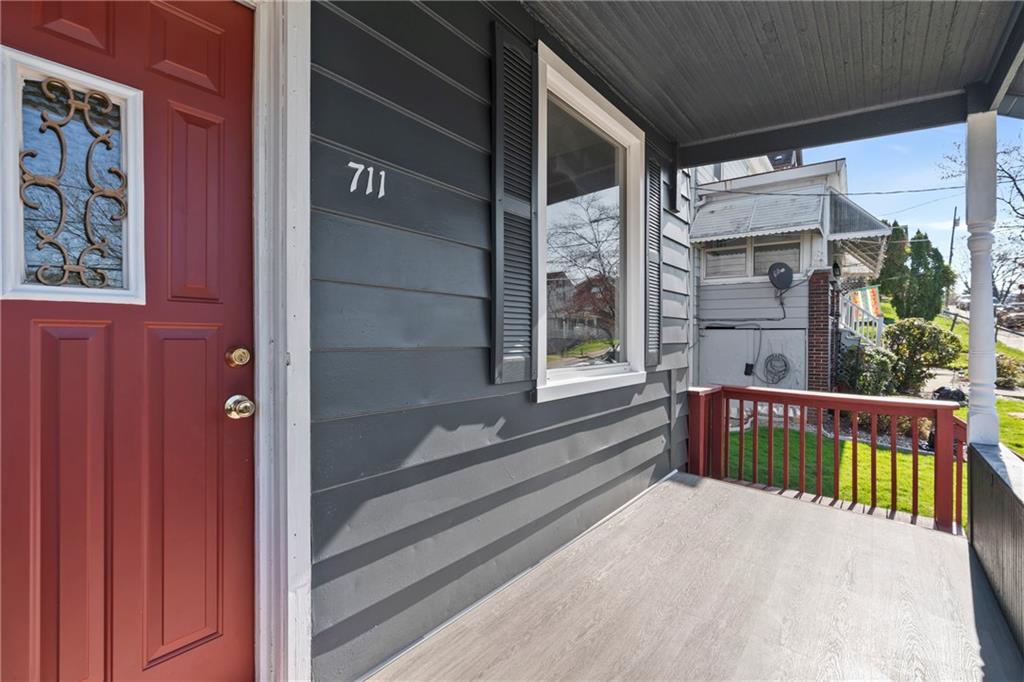 711 9th Avenue Irwin, PA 15642 - Photo 3 of 26 a view of front door and deck