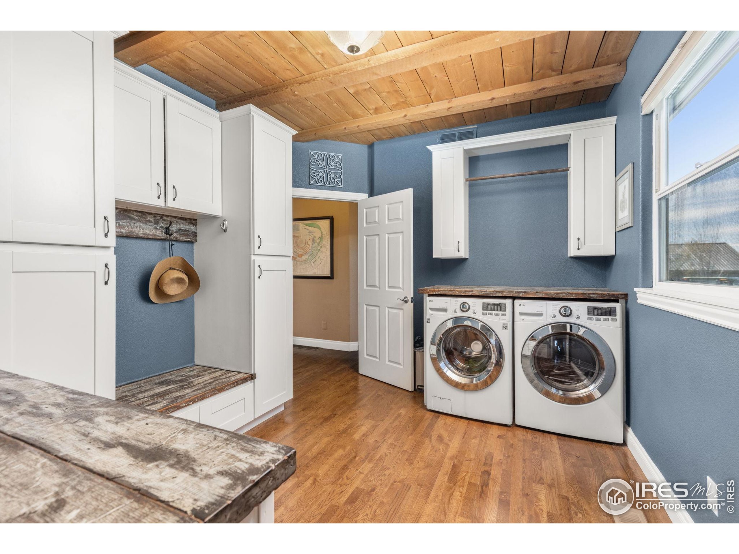 1822 Quarter Lane Berthoud, CO 80513 - Photo 20 of 49 a view of a storage and utility room with washer and dryer