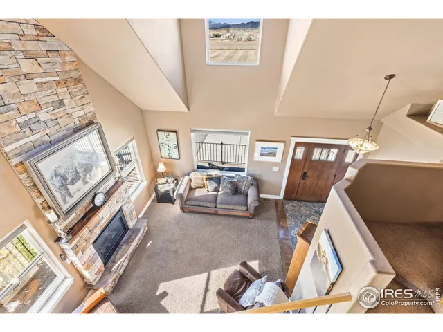 a room with furniture and a clock on the wall