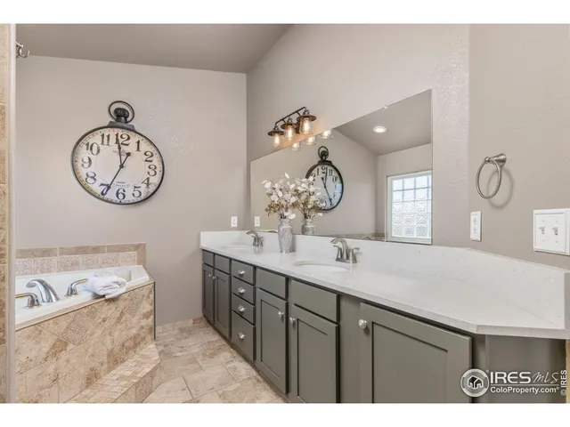a view of a balcony with furniture and wooden floor