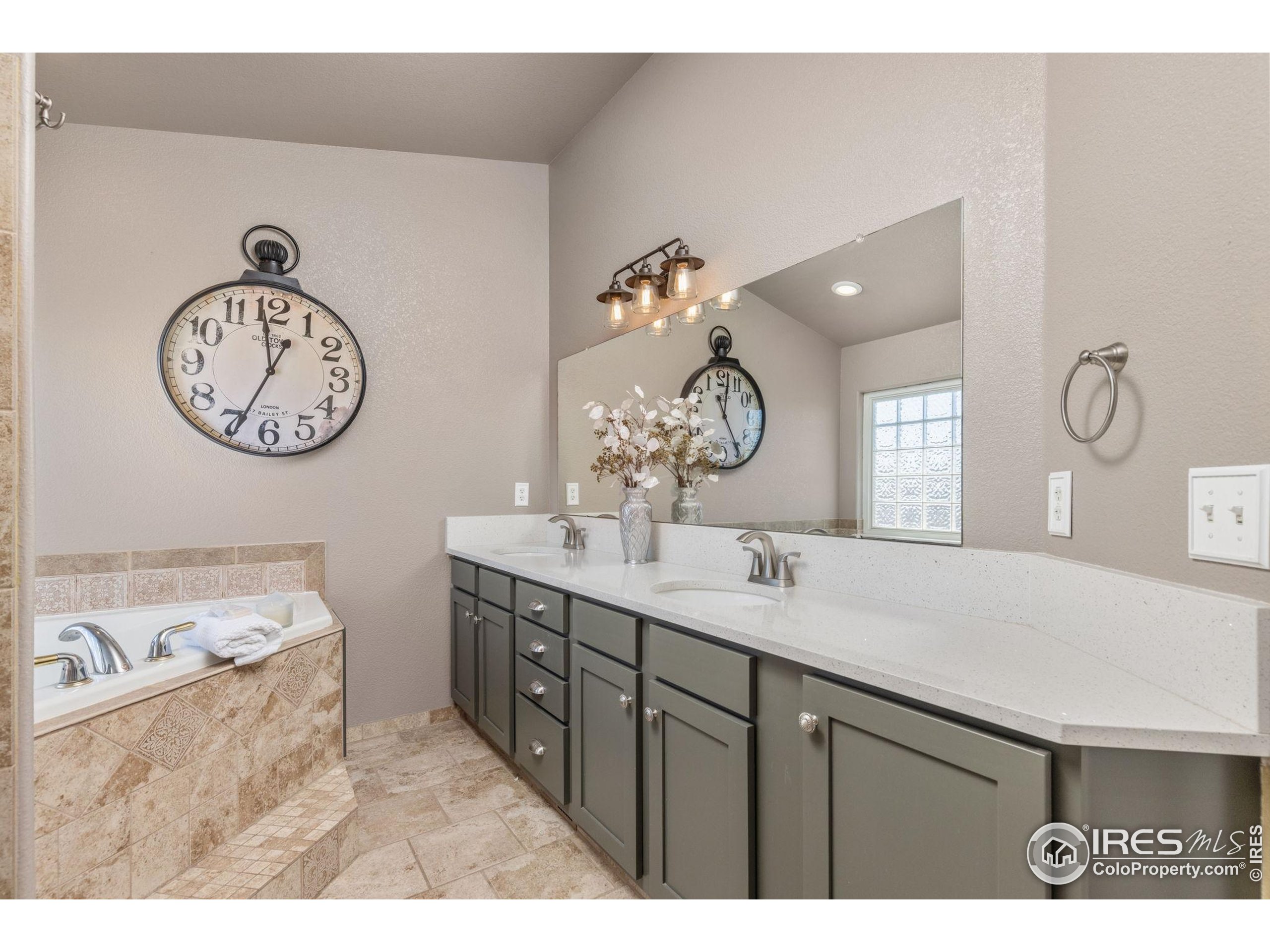 1822 Quarter Lane Berthoud, CO 80513 - Photo 26 of 49 a view of a hallway a chandelier