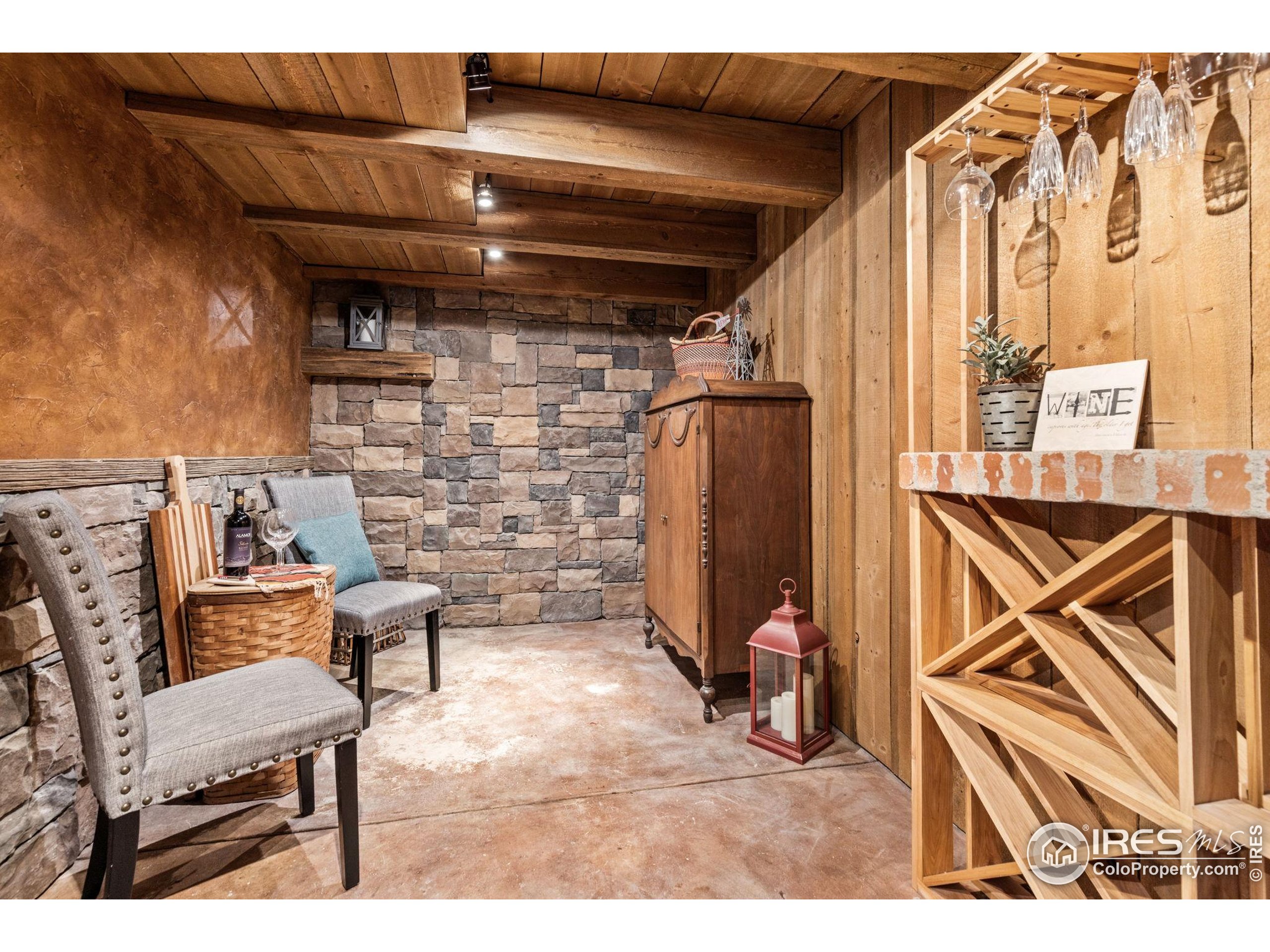 1822 Quarter Lane Berthoud, CO 80513 - Photo 32 of 49 a view of a chairs and table in a patio
