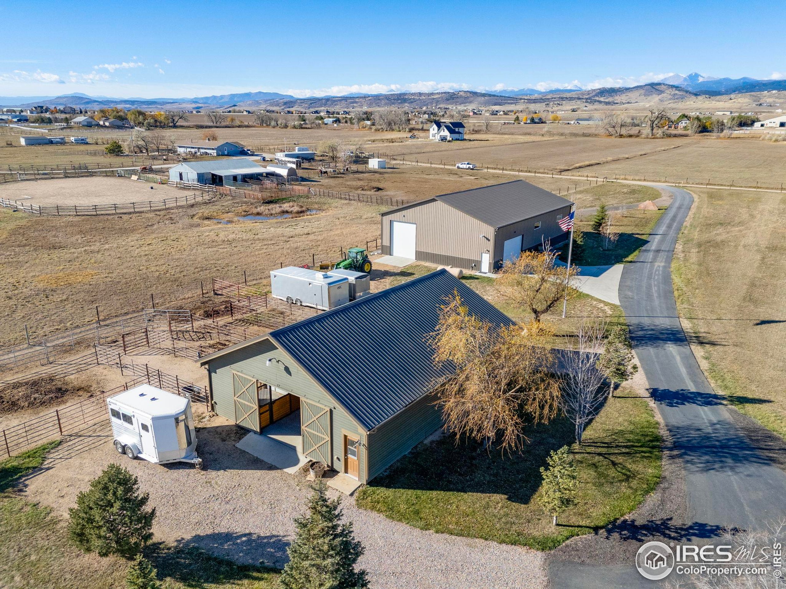 1822 Quarter Lane Berthoud, CO 80513 - Photo 4 of 49 an aerial view of a house with a yard