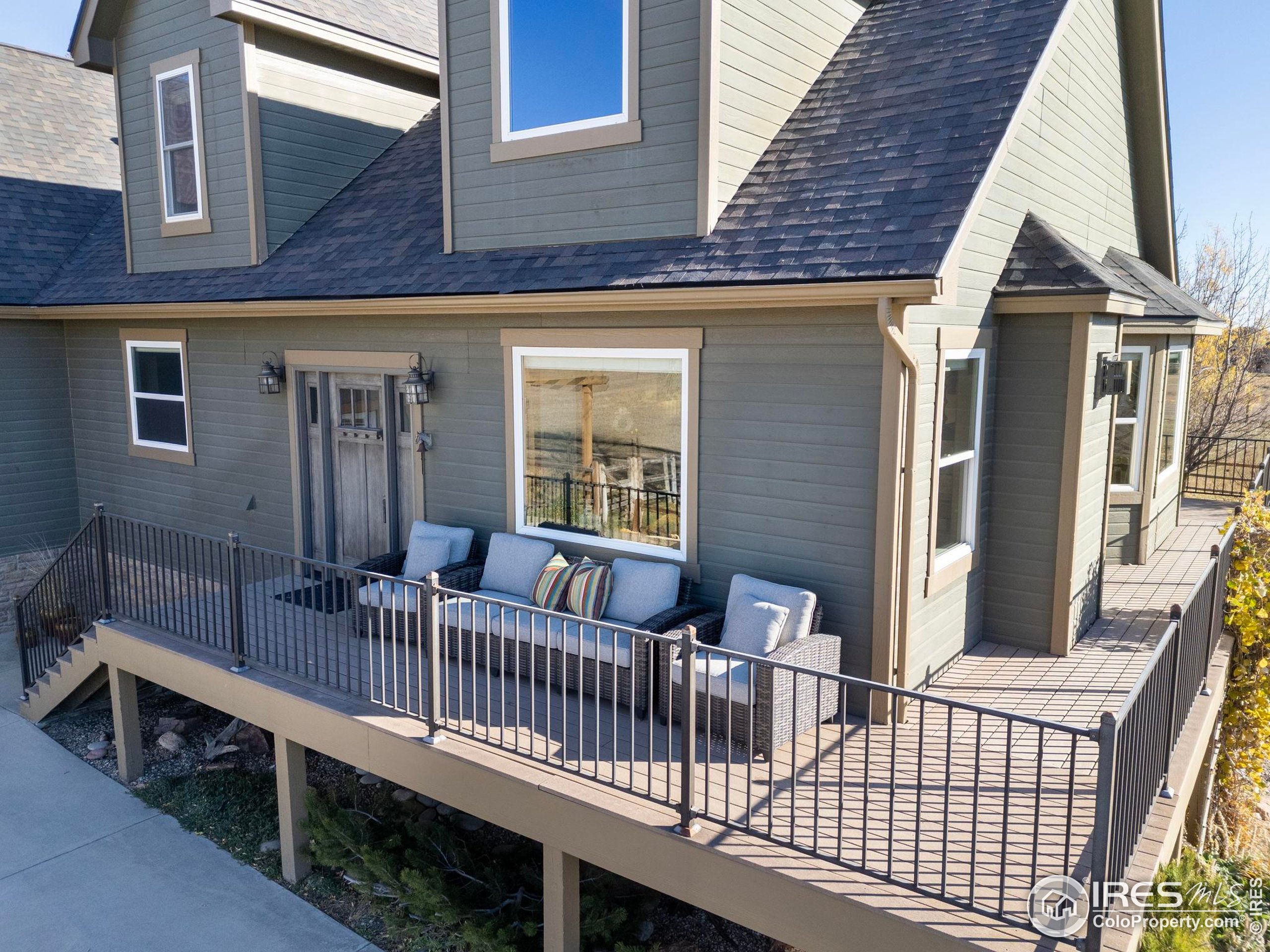 1822 Quarter Lane Berthoud, CO 80513 - Photo 41 of 49 a view of a house with deck and deck