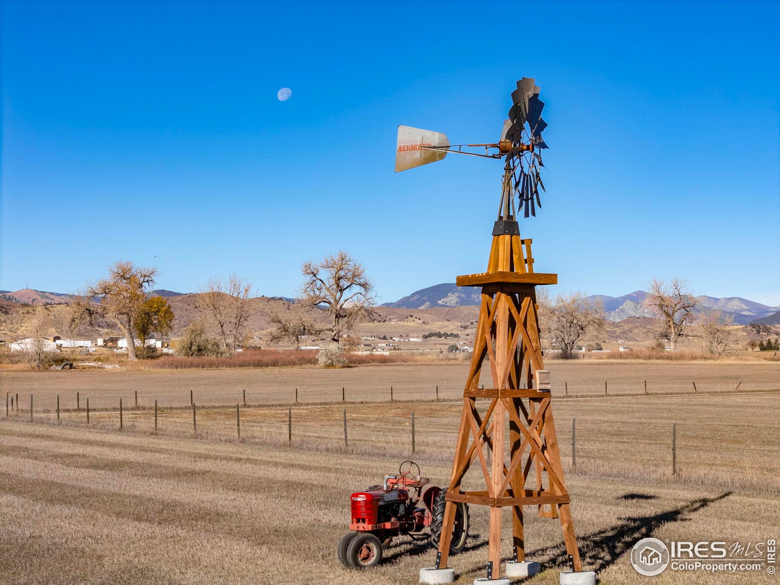 1822 Quarter Lane Berthoud, CO 80513 - Photo 49 of 49 a view of a terrace with a bench