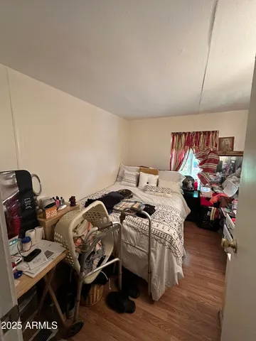 a theatre with furniture and wooden floor