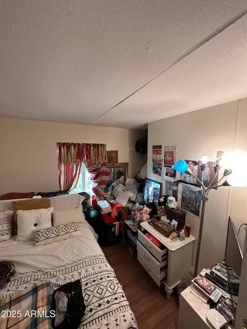 a bedroom with furniture and a couch