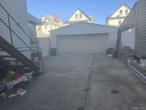 a view of a house with a street