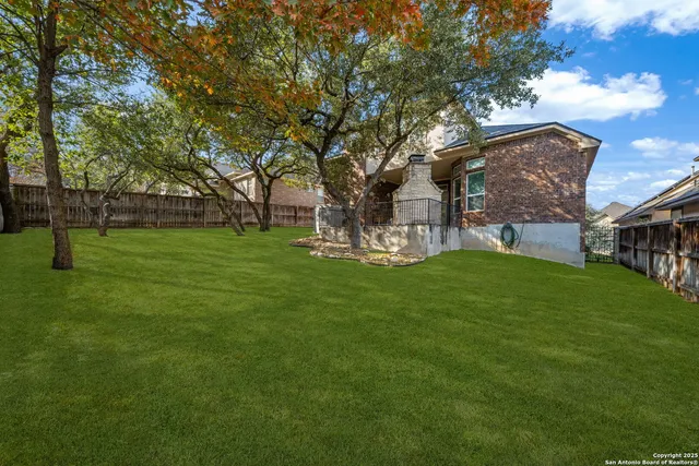 a view of a house with a big yard