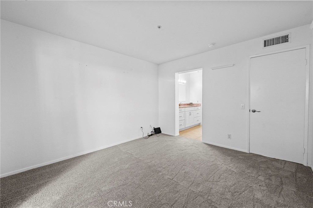 215 South Cross Creek Road, Unit L Orange, CA 92869 - Photo 25 of 50 a view of an empty room