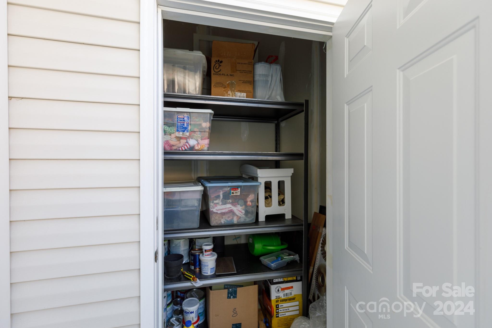 3051 Summerfield Ridge Lane Matthews, NC 28105 - Photo 22 of 23 a cabinet with wine cabinets