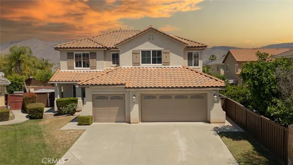 a front view of a house with a garage