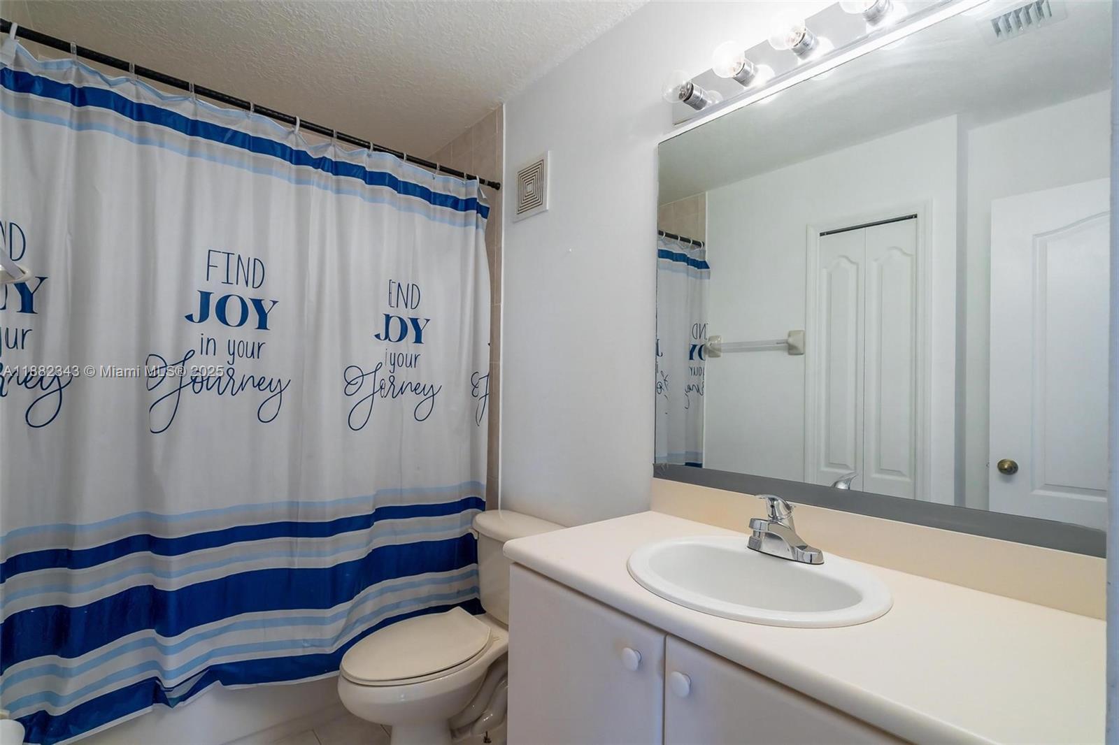 4455 Southwest 160th Avenue, Unit 205 Miramar, FL 33027 - Photo 24 of 44 a bathroom with a sink toilet and shower