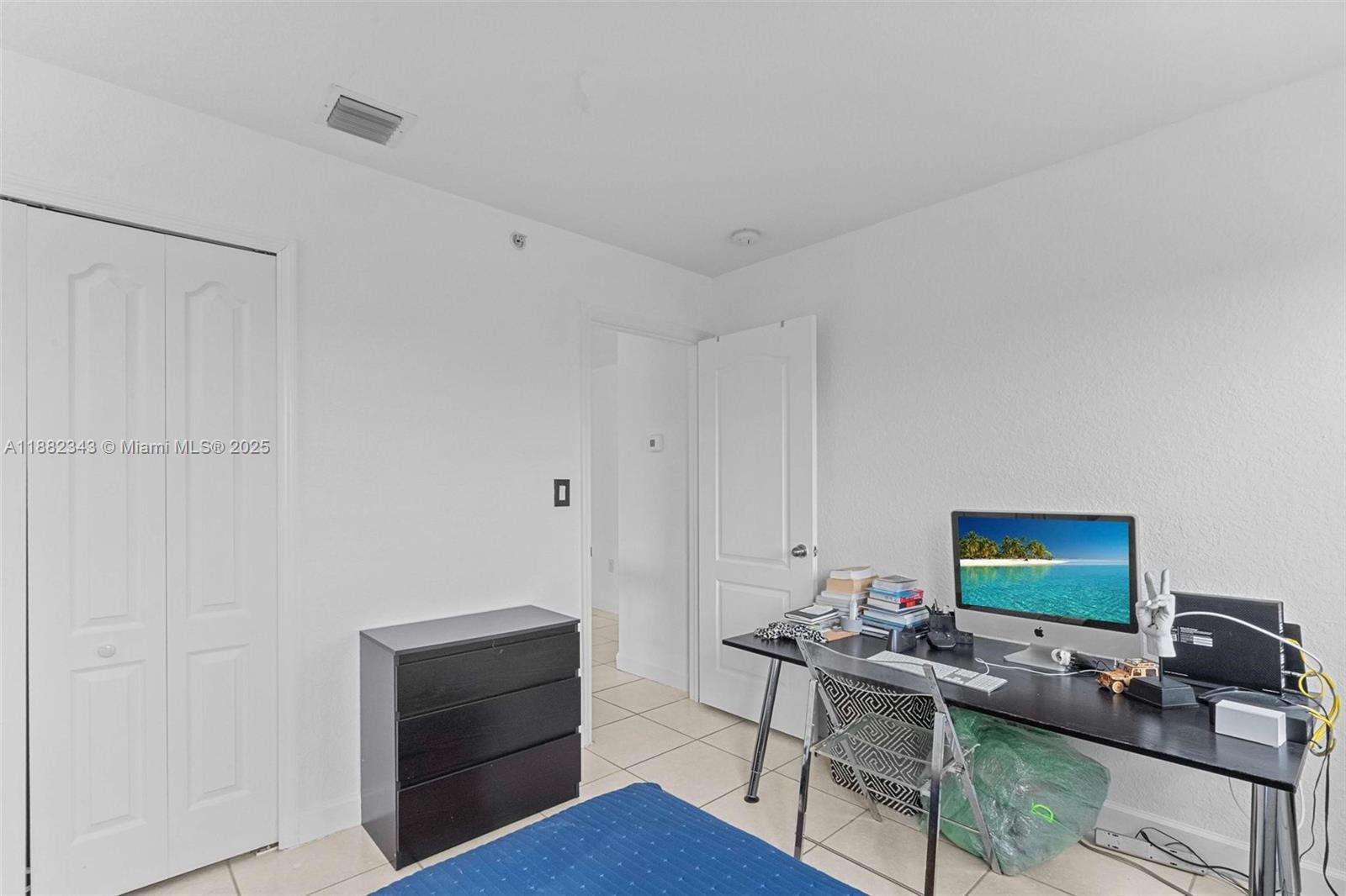 4455 Southwest 160th Avenue, Unit 205 Miramar, FL 33027 - Photo 27 of 44 a living room with furniture and wooden floor