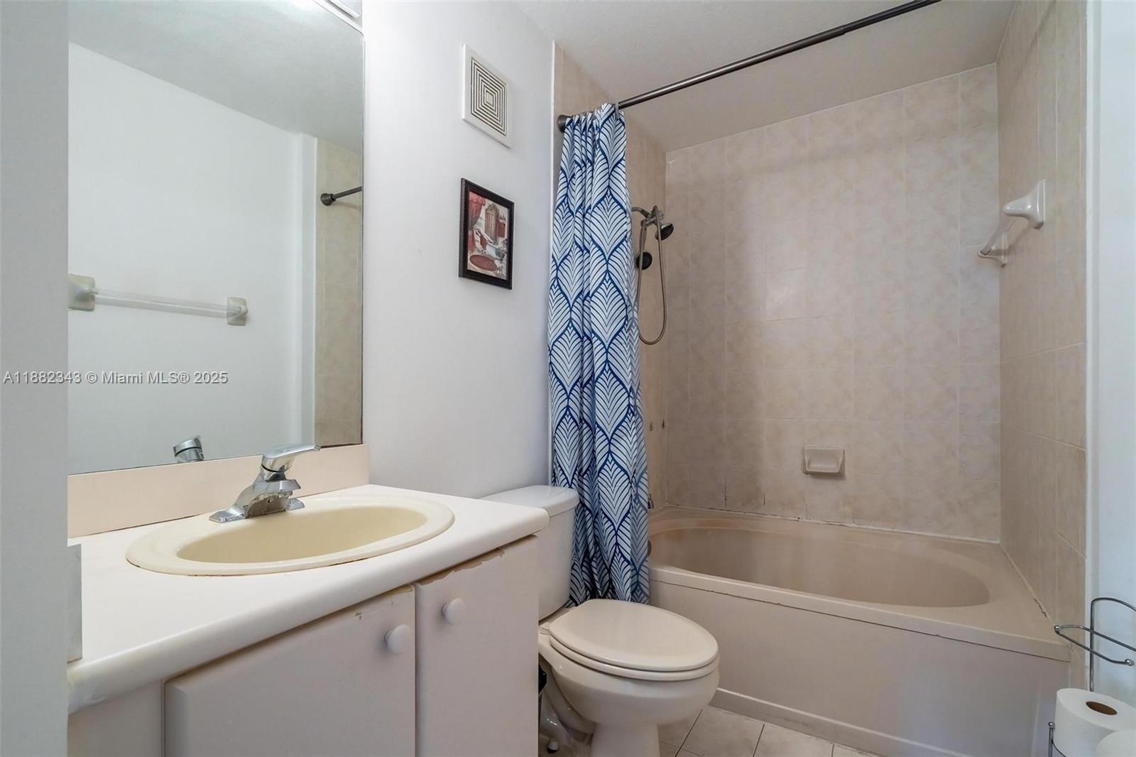 4455 Southwest 160th Avenue, Unit 205 Miramar, FL 33027 - Photo 34 of 44 a bathroom with a sink toilet and shower