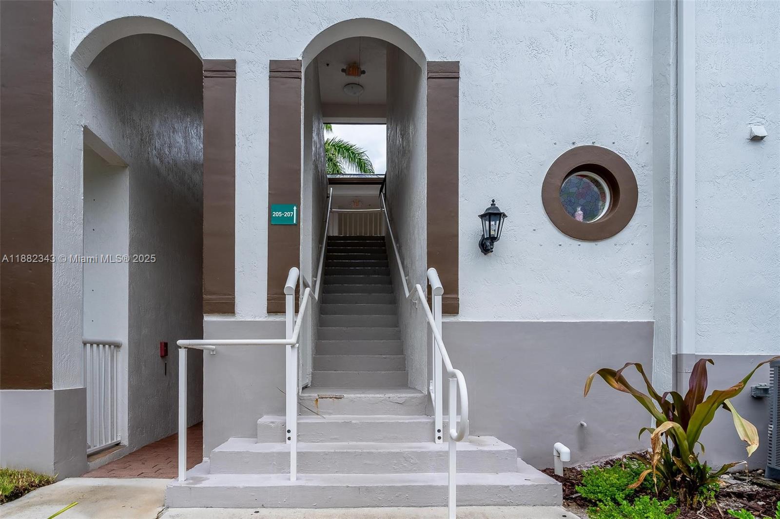 4455 Southwest 160th Avenue, Unit 205 Miramar, FL 33027 - Photo 44 of 44 a front view of a house with entryway