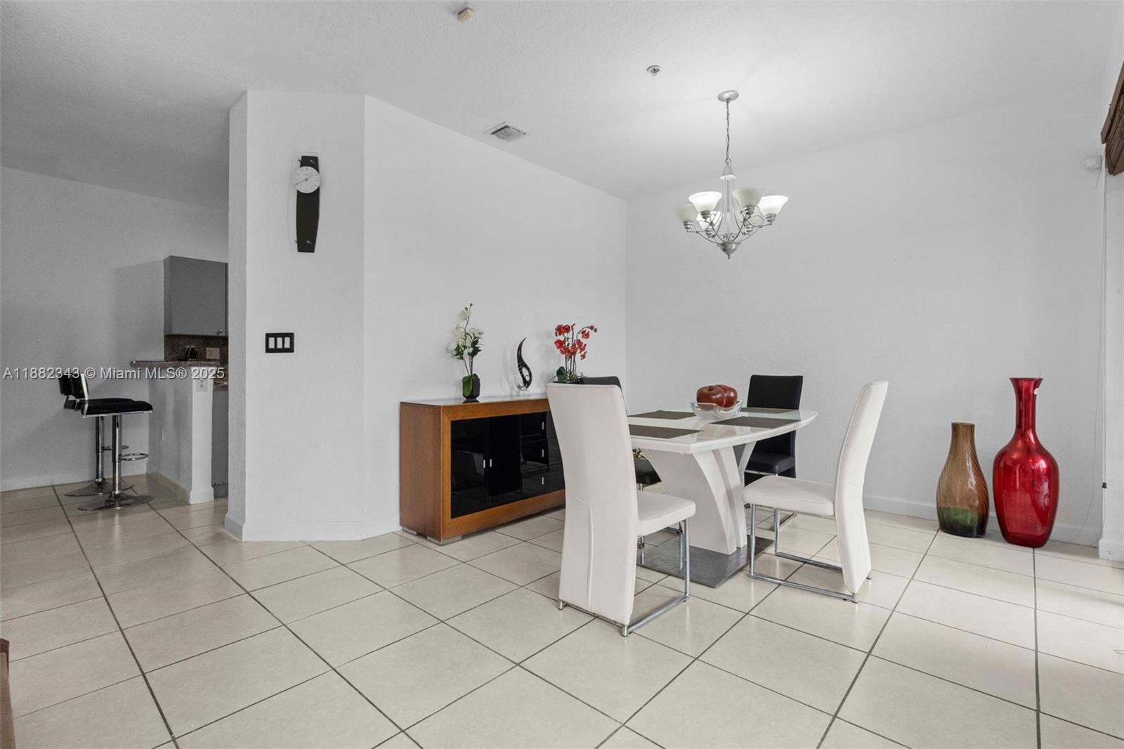 4455 Southwest 160th Avenue, Unit 205 Miramar, FL 33027 - Photo 5 of 44 a view of a dining room with furniture