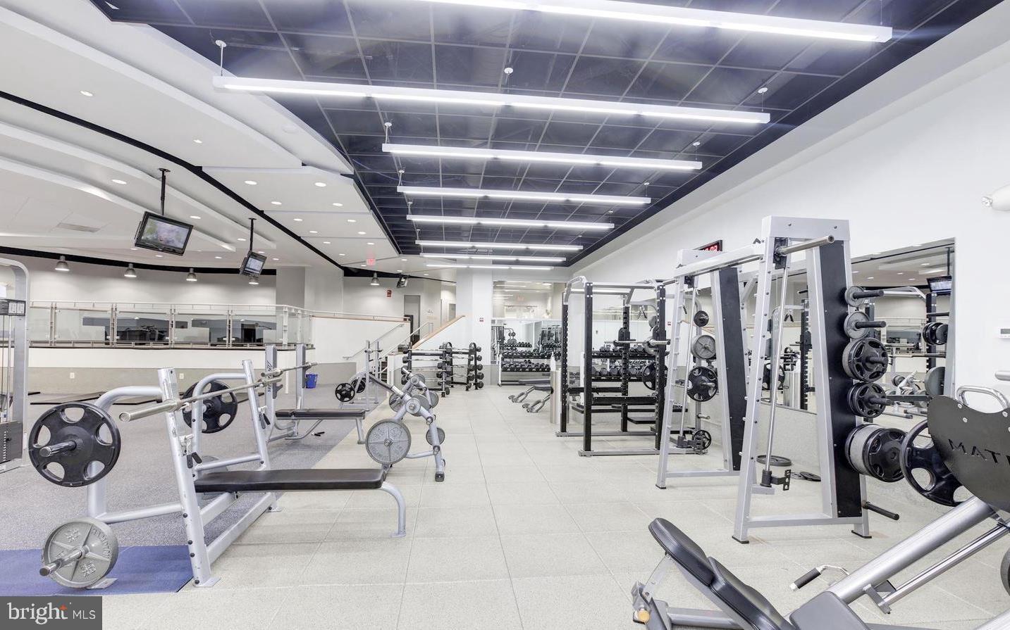 1111 Arlington Boulevard, Unit 731 Arlington, VA 22209 - Photo 32 of 46 a view of a room with gym equipment