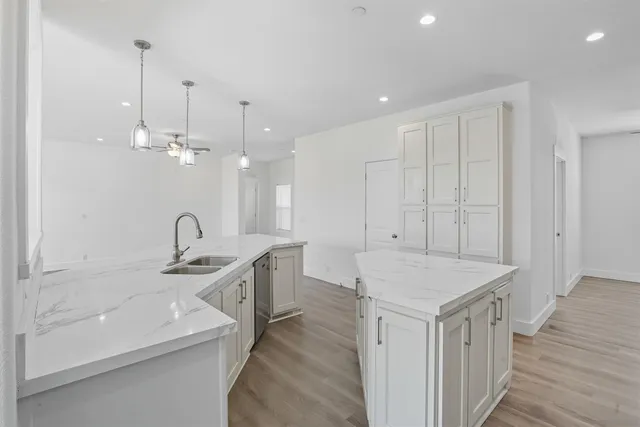 a very nice looking dining room with a table and chairs