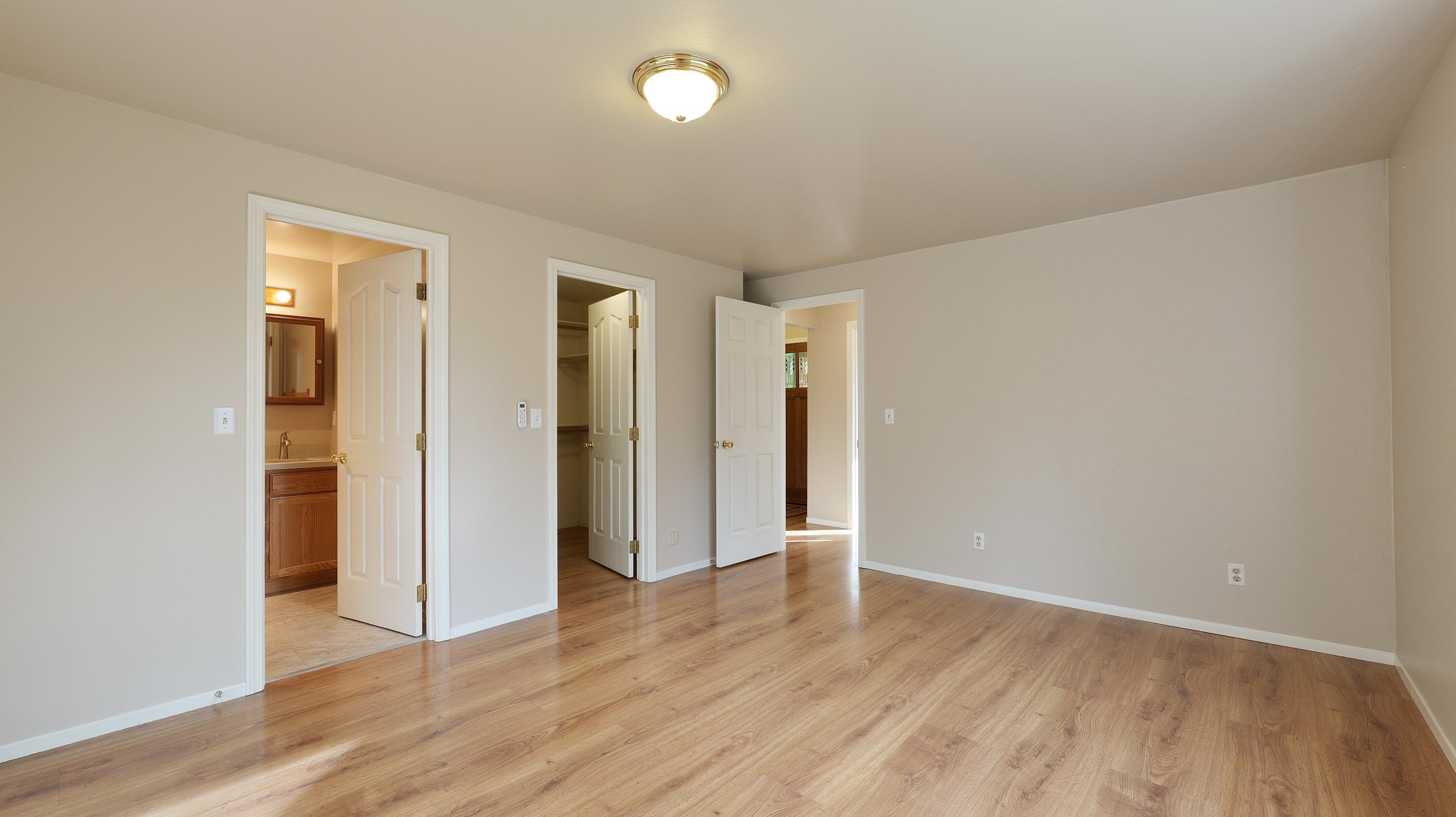 204 Shipley Terrace Prospect, OR 97536 - Photo 22 of 61 an empty room with wooden floor and closet