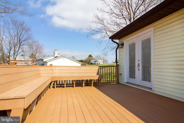 a view of a patio with a yard