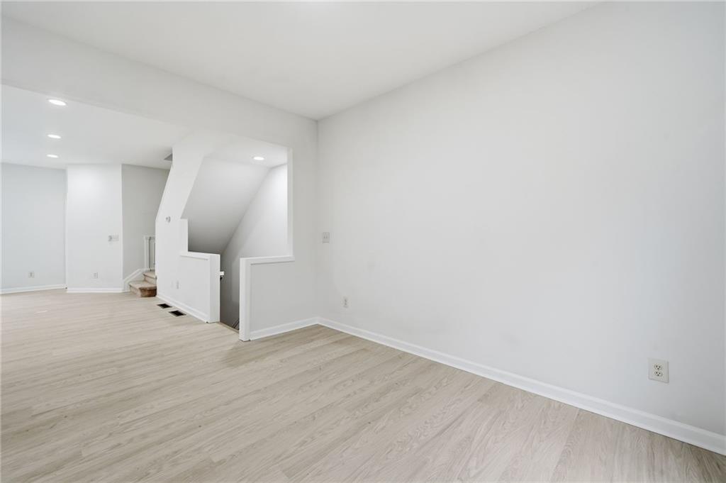3349 Lathenview Court Alpharetta, GA 30004 - Photo 11 of 48 a view of a room with wooden floor