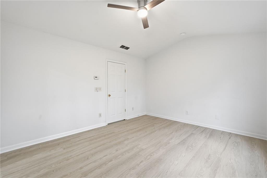 3349 Lathenview Court Alpharetta, GA 30004 - Photo 15 of 48 a view of a room with wooden floor