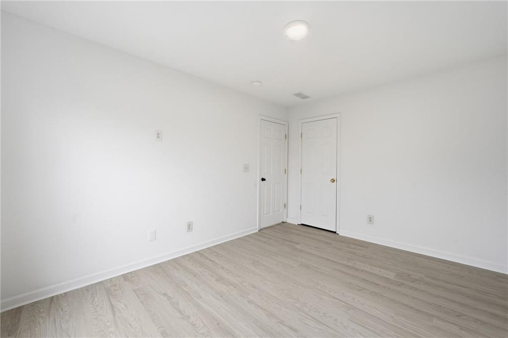 3349 Lathenview Court Alpharetta, GA 30004 - Photo 19 of 48 a view of an empty room